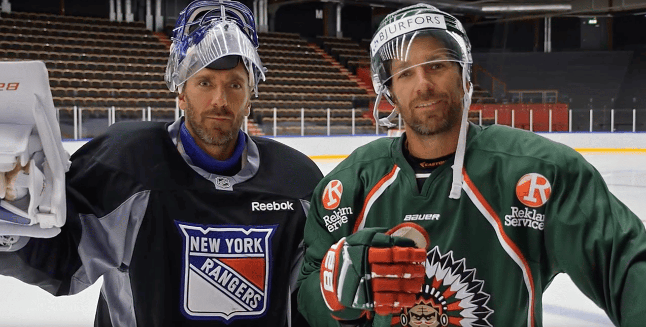 Henrik Lundqvist standing whit his brother on the ice