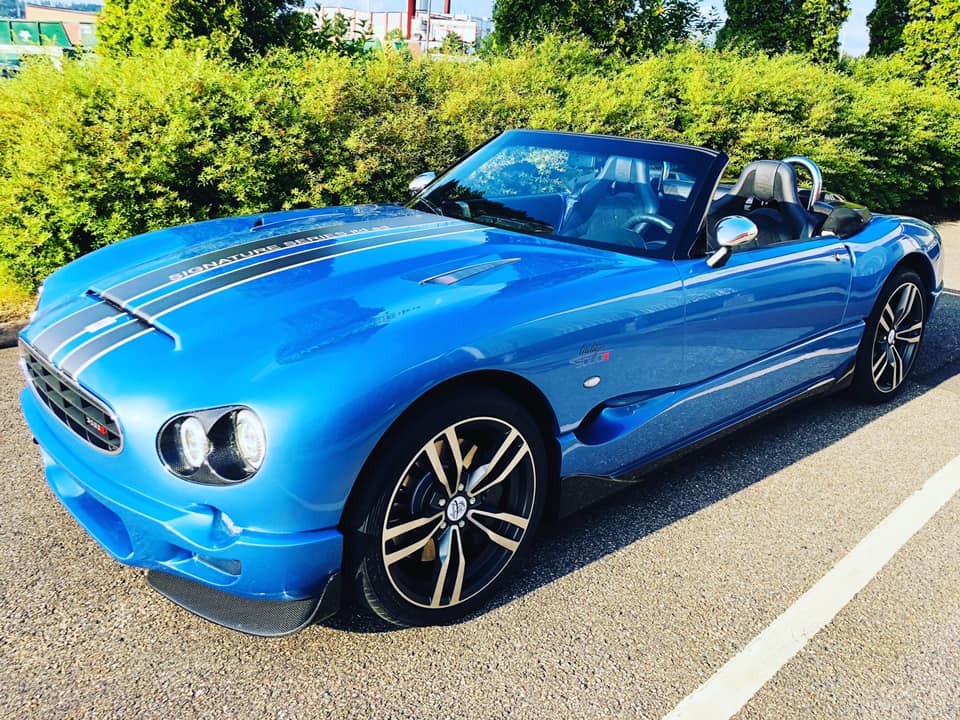 indigo car in parkinglot