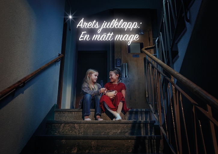 two small girls sitting on a staircase