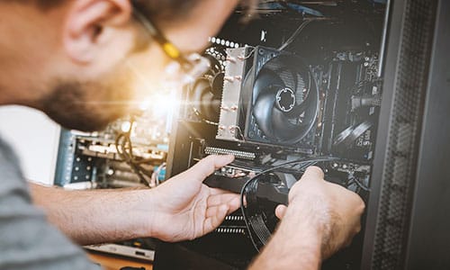 man working on a computer