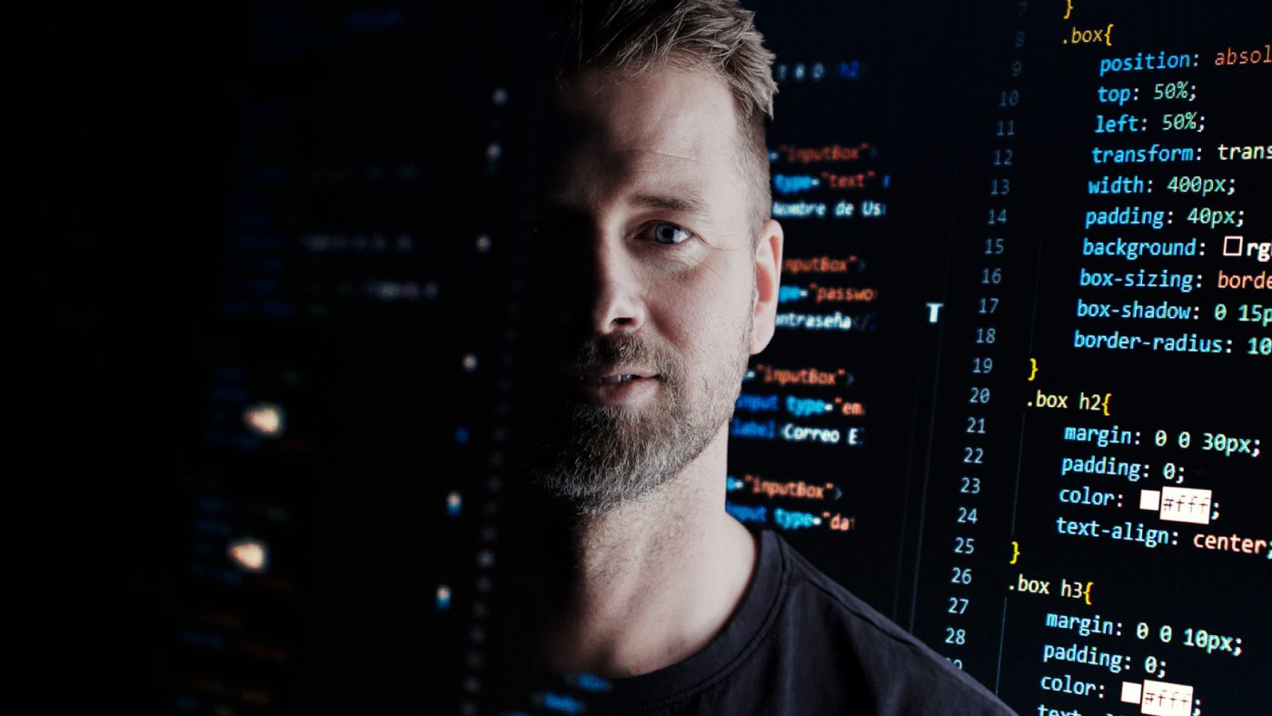 man infront of code